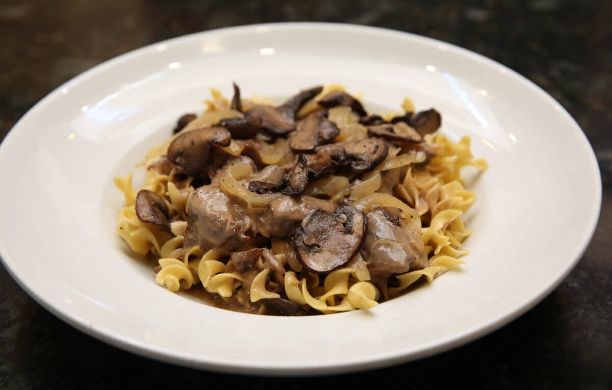 Short Rib Beef Stroganoff with wide egg noodles, long-braised short rib pieces, wild mushrooms, caramelized onions, and stroganoff sauce.